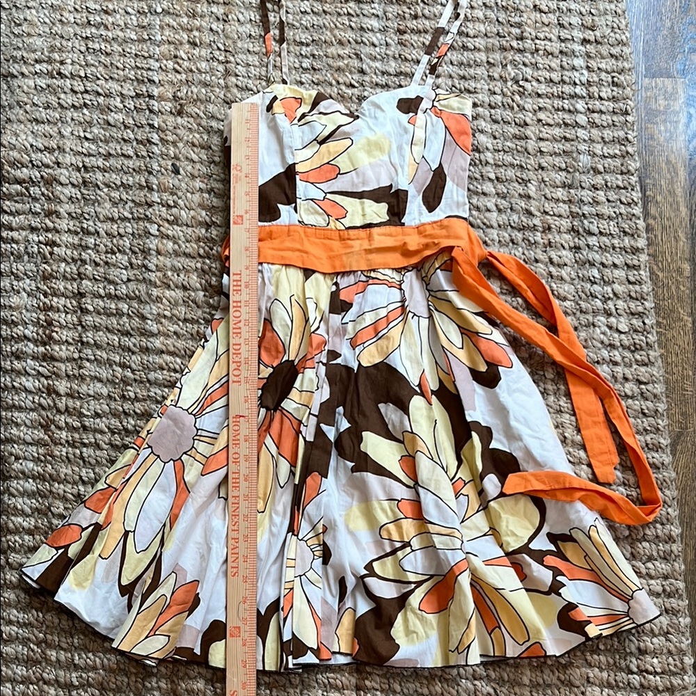 DeJaVu boutique Seaside Florida. Floral Daisy Dress with Orange Accents